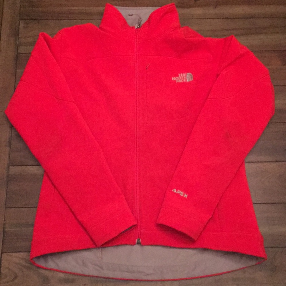 Bright orange/red north face jacket
